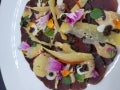Carpaccio z sarny z fermentowanym pieprzem 